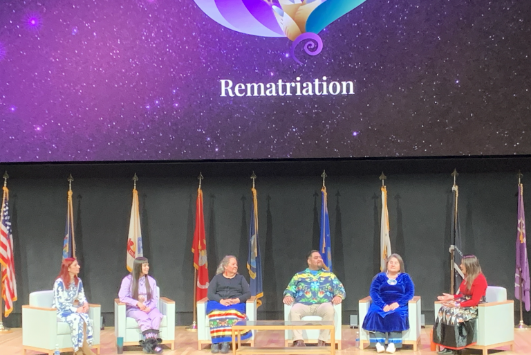 Panelists join the stage at the Rematriation symposium’s closing keynote panel on March 1.